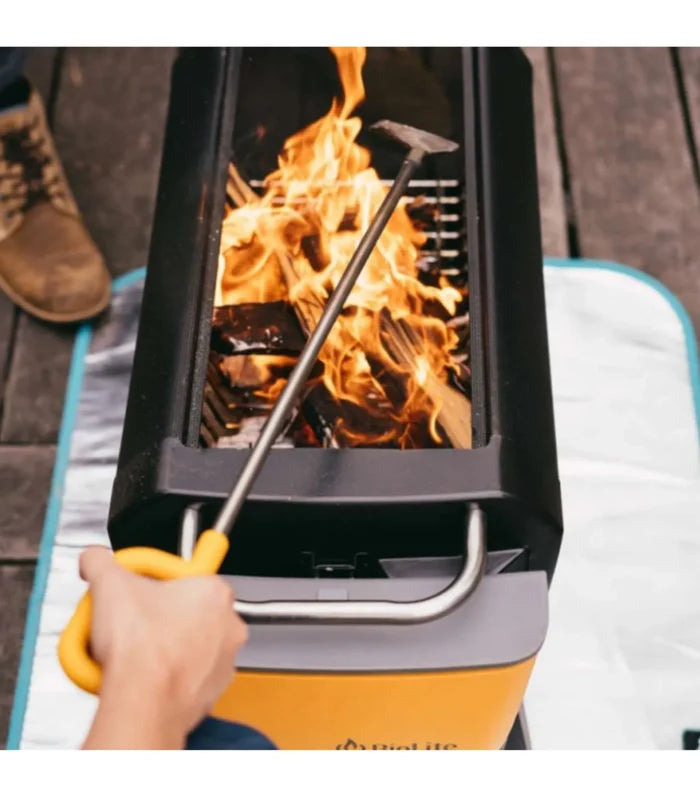 The poker's broad flat edge helps stoke fuel and ensure logs are properly stacked for ideal airflow