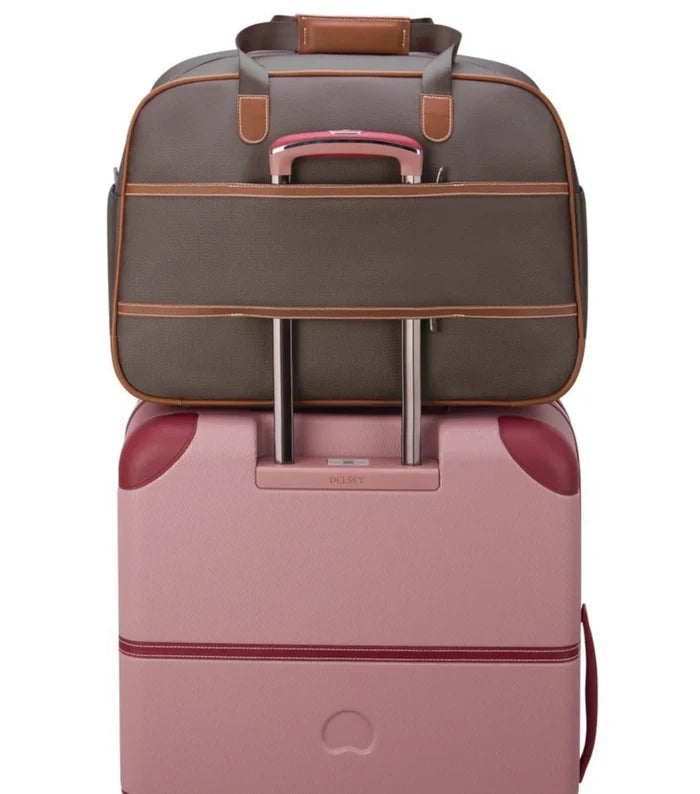 Trolley system compatible allowing the bag to slide over a suitcase handle (sold separately)