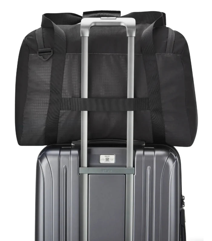 Trolley system compatible allowing the bag to slide over a suitcase handle (sold separately)
