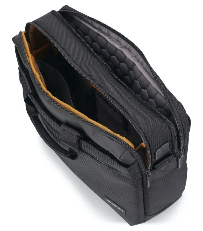 Black textured nylon hedgren byte laptop briefcase fits laptops with mustard-yellow padded compartments and rfid protection