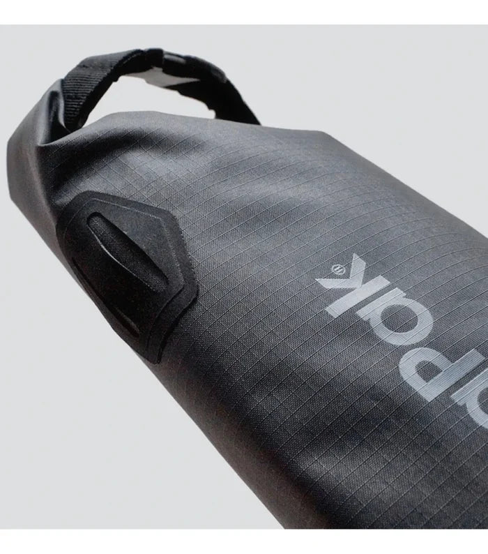 Buckle closure creates a handle for convenient carrying and provides a hang point