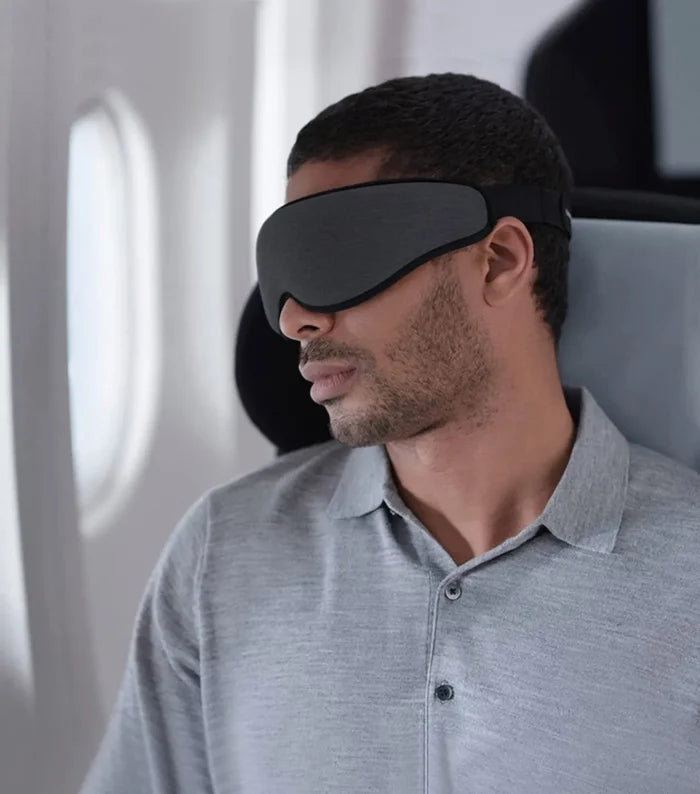 Ostrichpillow eye mask dark night in black soft fabric with adjustable strap for ergonomic eye mask blackout experience