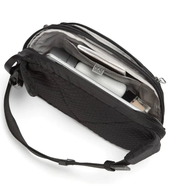 Pacsafe v anti-theft hip pack in jet black made from post-consumer recycled polyester with rfid-blocking interior