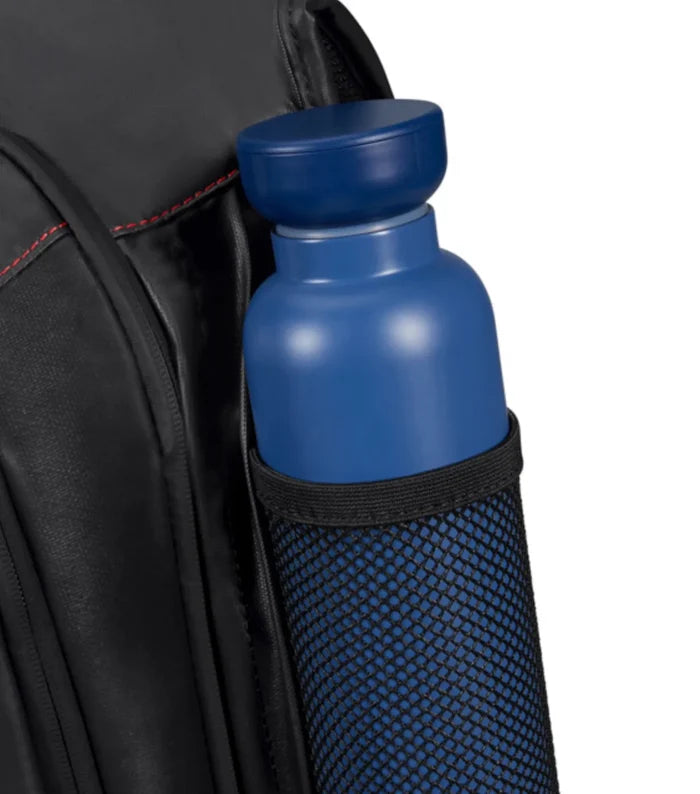Hidden zippered side pocket with mesh water bottle holder