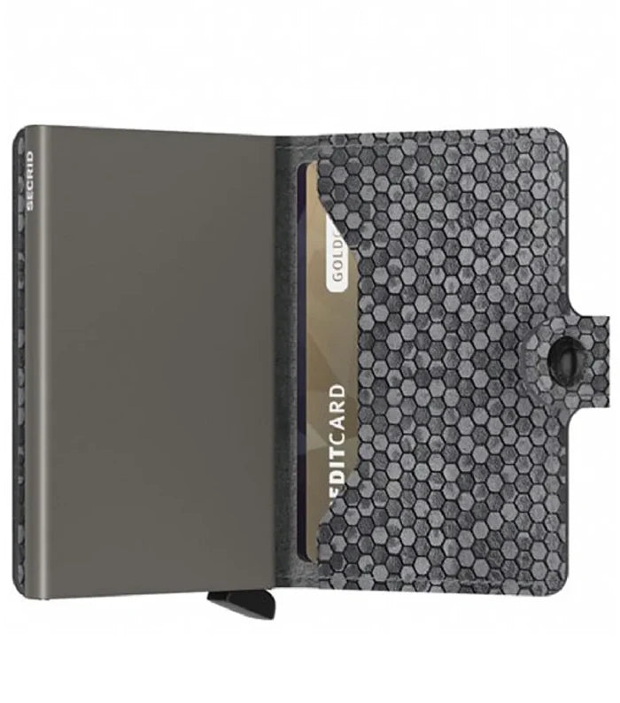 Includes two interior pockets for holding cards, notes, receipts, business cards and some coins
