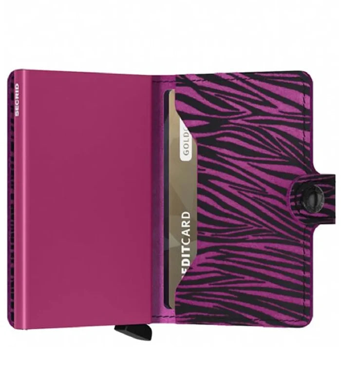 Soft leather enriched by a zebra-inspired 3D flock print for a lush, velvety touch.