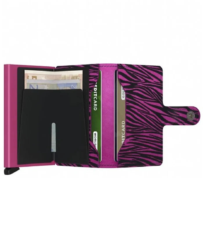 Includes two interior pockets for holding cards, notes, receipts, business cards and some coins