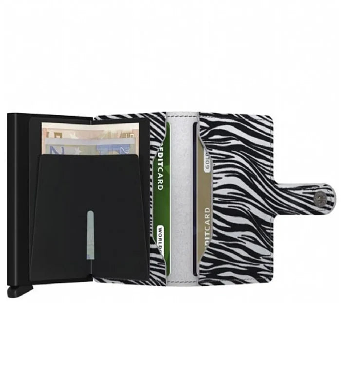 Includes two interior pockets for holding cards, notes, receipts, business cards and some coins