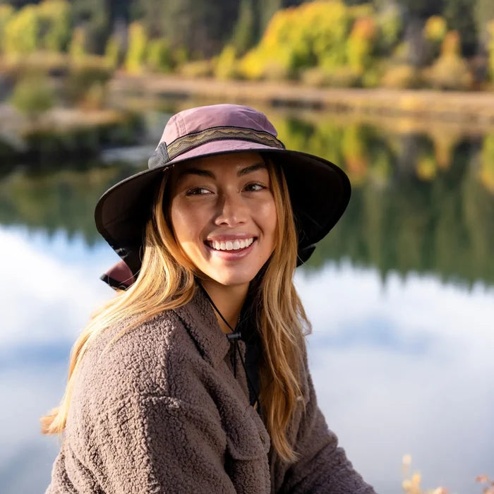 A woman wearing a Sunday Afternoons Adventure Hat