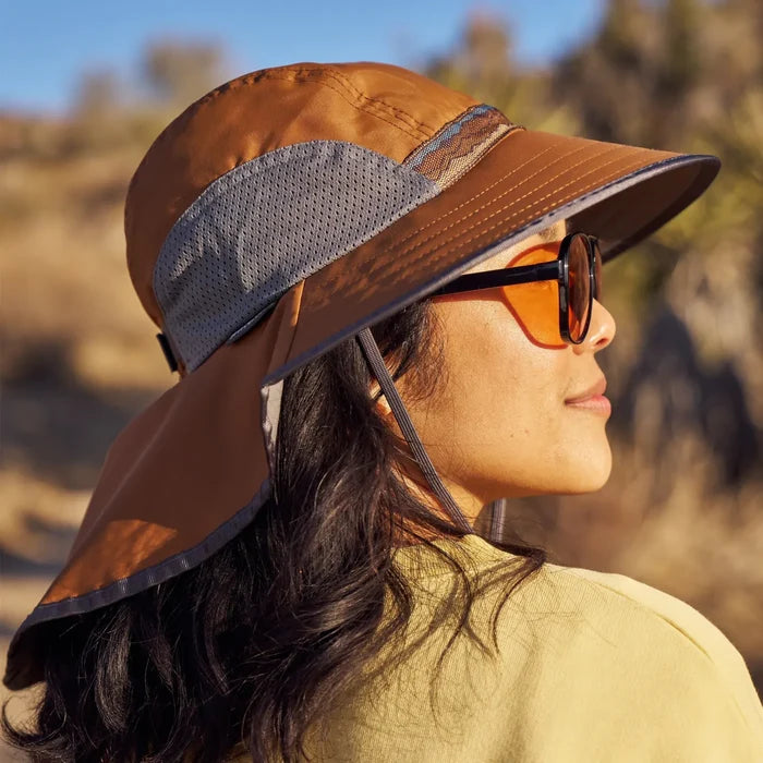 A woman wearing a Sunday Afternoons Adventure Hat