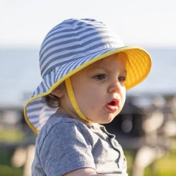 A Sunday Afternoons Infant Sunsprout Hat being worn outdoors