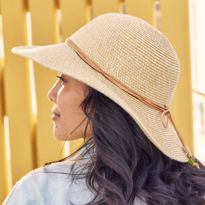A Sunday Afternoons Sol Seeker Hat being worn outdoors in Agate