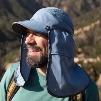 A Sunday Afternoons Sun Guide Cap being worn outdoors