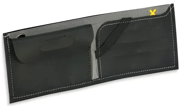 There are also compartments for notes, credit cards, business cards, and a handy strap to keep them in place.