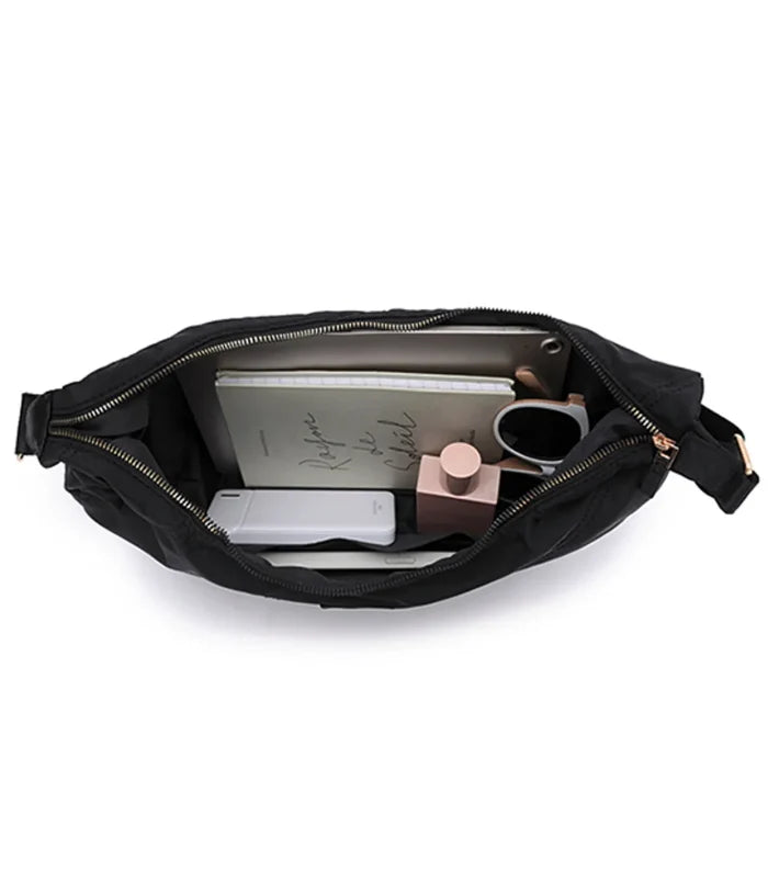 Black nylon tosca harlow hobo bag with gold-tone zipper pulls and adjustable strap for easy carrying