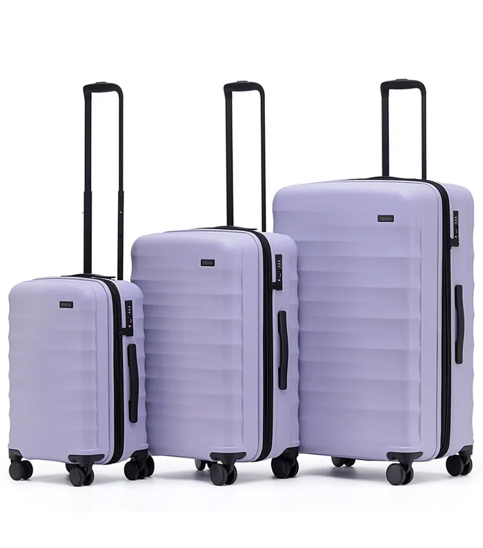 Set of three lavender tosco interstellar 2.0 hard-shell suitcases with black trim in small medium and large sizes