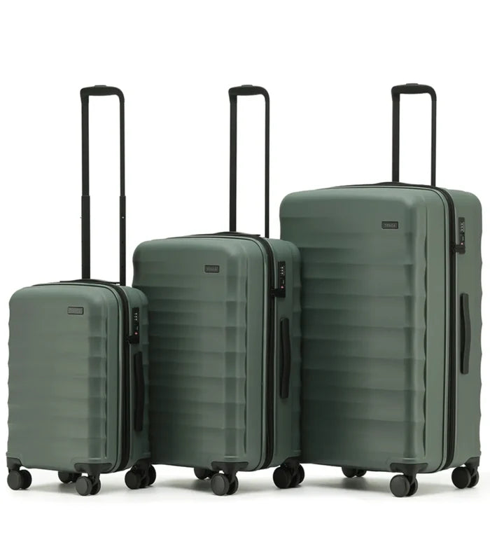 Set of three moss green tosca interstellar 2.0 lightweight polycarbonate suitcases with black wheels and expandable dimensions