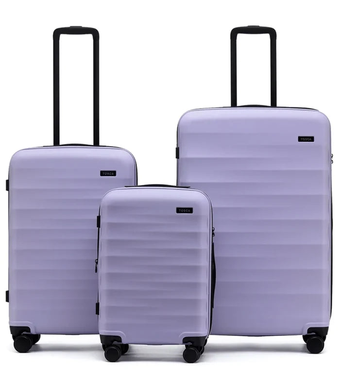 Set of three lavender tosco interstellar 2.0 hard-shell suitcases in three sizes with black handles and wheels