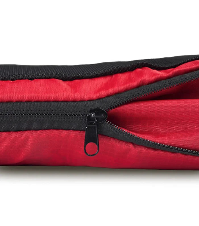 Second zipper compresses the contents of the cube