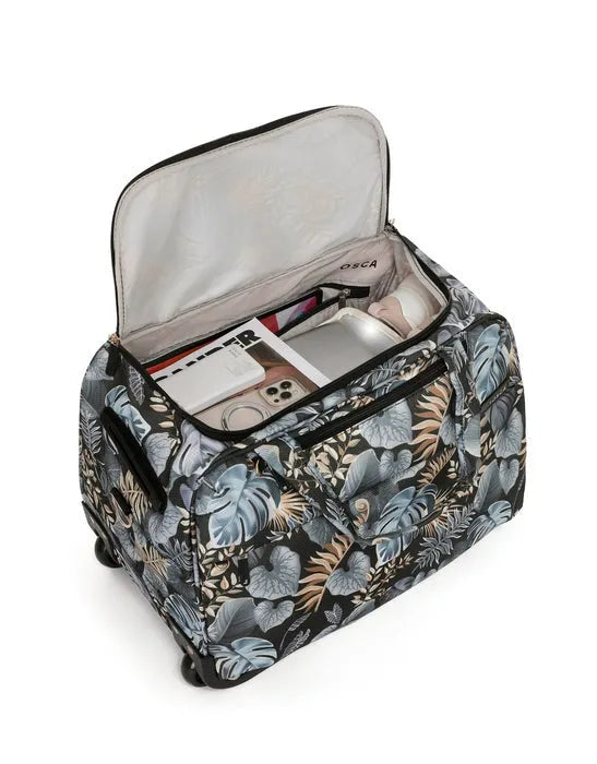 Tosca so lite onboard wheel bag with teal gray beige tropical leaf pattern holds all your travel acessories
