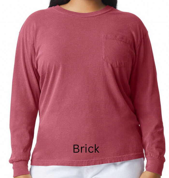 Person wearing a brick red long-sleeve shirt on a white background